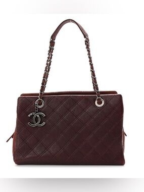 CHANEL Diamond Embossed Leather Shopping Tote in Burgundy